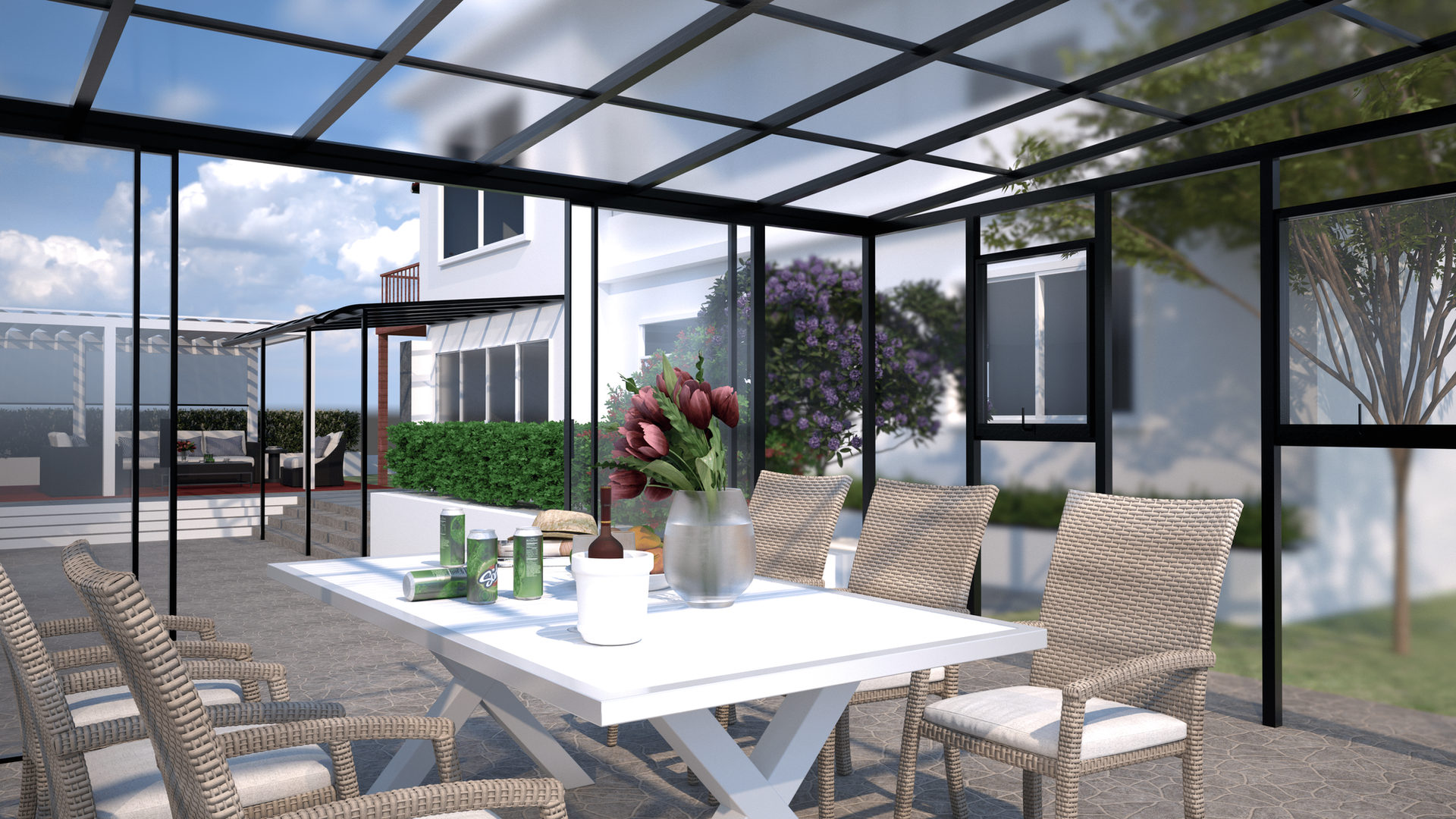 Glass sunroom with a dining table set for lunch