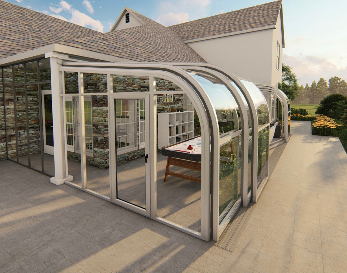 Retractable sunroom opened up on a warm evening